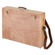 a wooden briefcase with brown straps and handles