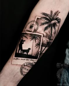 a man's arm with an image of a dog and palm trees on it