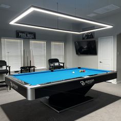 a pool table is in the middle of a room