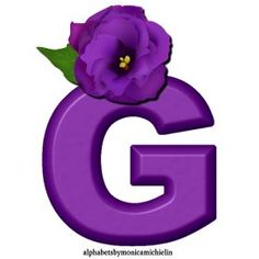 the letter g has a purple flower on it