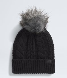 The popular Women’s Oh Mega Fur Pom Beanie now features a body made from 100% recycled fabric, an oversized faux fur pom and updated, modern cabling. As one of our Circular Design styles, it’s made from sustainably conscious materials and recyclable when you get it back to us. Women's Women's Beanies [North Face, Northface, thenorthface, the northface, TNF, tnf] Girl Beanie, Retro Brand, Circular Design, Women's Beanie, Boys Accessories, Hiking Women, Sock Shop, Water Repellent Fabric, Polyester Yarn