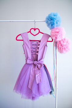 This Pinkie Pie Inspired Tutu dress is perfect for Birthday party, Halloween party and Dress up The dress is made with high quality fabrics. Top of the dress: 100% cotton fabric Bottom of the dress: High quality lycra soft tulle fabric ( soft and not stiff) Lining: 100% cotton fabric There is a corset like closing at the back of the dress which lets to adjust the fit of the dress. There is an elastic band at the back of the waistband. The dress is easy to pull on and very adjustable. This dress Pink Dress For Halloween Dress-up, Princess Tutu Dress For Party Season, Fitted Fairy Dress For Party, Purple Sleeveless Tutu Dress For Party, Fairy Style Sleeveless Dress For Party, Princess Style Fairy Dress For Summer Costume Party, Pink Fitted Fairy Dress For Costume Party, Princess Style Fitted Tutu Dress For Party, Purple Sleeveless Fairy Dress For Party