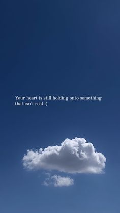 there is a cloud in the sky with a quote above it that says, your heart is still holding on to something that isn't road