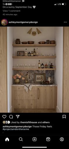 a kitchen with wooden cabinets and shelves filled with dishes