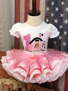 1 Full Tutu Embroidery design and glitter pink aplique number w/Embroidery Name shirt or bodysuit SHIRT BRANDS 2t 3t 4t 5t -E&B blanks or AJ blanks brand (depending on the availability at time of making) IF YOU LIKE LONG SLEEVE PLEASE ASK ME FOR SIZE ABILITY. BODYSUITS 6-12m, 12-18m AJ Blanks or E&A blanks (depending on the availability at time of making) **TUTU LENGTHS 12-2T - (7 INCHES LONG) 3T-(8 INCHES LONG) 4T-5T-(9 INCHES LONG) 6-7-(10 INCHES LONGG) Size 3T and larger should wear the tutu Farm Birthday Outfit, Rodeo Birthday Parties, Cow Birthday Parties, How To Make Tutu, Handmade Tutu, Rodeo Birthday, Barn Animals, Cow Birthday, Farm Animal Birthday