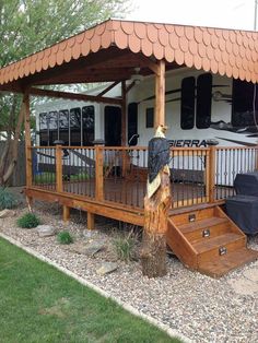 a wooden deck with steps leading up to it