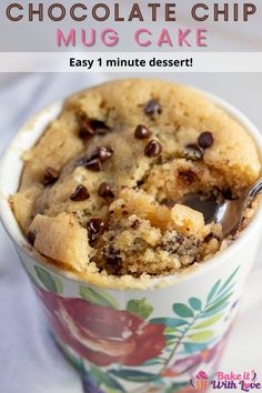 chocolate chip mug cake in a flowered cup with a bite taken out of it