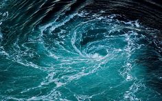 an ocean wave is seen from above