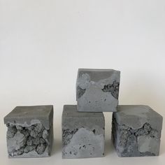 four cement blocks stacked on top of each other