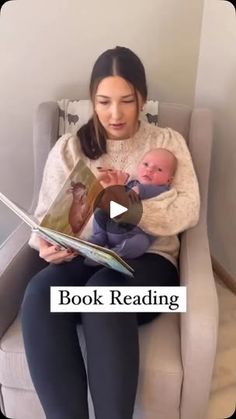 a woman sitting in a chair holding a baby and reading a book with the caption'book reading '