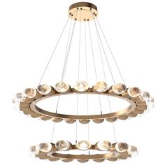 a large chandelier with many lights hanging from it's center and two circular rings