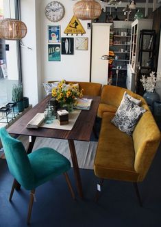 a living room filled with furniture and decor