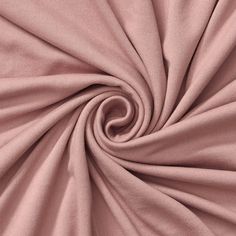 a close up view of a pink fabric