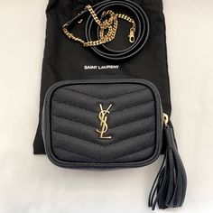 Authentic Saint Laurent Crossbody Bag New With Dust Bag Rare Color: Dark Blue With Gold Hardware Note: Last Photo To Show Length & Size 100% Calfskin Dimensions: 12 X 8,5 X 4 Cm / 4.7 X 3.3 X 1.5 Inches Shoulder Strap Drop: 52 Cm / 20.4 Inches Gold-Toned Metal Hardware Zip Closure Interior: One Main Compartment Luxury Crossbody Belt Bag For Shopping, Elegant Shoulder Belt Bag For Shopping, Elegant Belt Bag With Removable Pouch For Shopping, Luxury Travel Belt Bag With Branded Hardware, Chic Belt Bag For Travel, Luxury Evening Belt Bag, Luxury Belt Bag With Branded Hardware For Everyday Use, Luxury Rectangular Belt Bag With Branded Hardware, Luxury Belt Bag With Branded Hardware