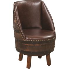 a wooden barrel chair with studded leather upholstered on the seat and back