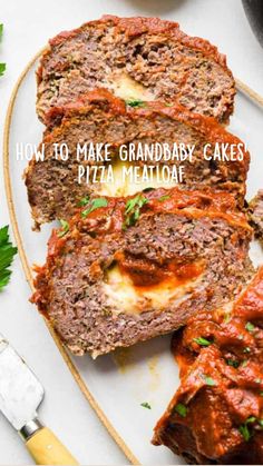 sliced meatloaf on a plate with sauce and parsley next to the bread