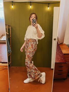 A stretchier material was used for these fun pants! They are flare and high waisted and have a stretchy waist! Brand: Shein Floral Flare Pants Outfit, 70s Inspired Wide Leg Pants For Fall, 70s Inspired Wide Leg Bottoms For Fall, 70s Inspired High Waist Bottoms For Spring, 70s Inspired High Waist Bottoms For Fall, 70s Inspired Flare Bottoms For Spring, 70s Inspired Wide Leg Fall Bottoms, Retro Fitted Pants For Day Out, 70s Inspired Straight Leg Pants For Fall