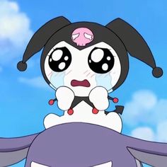 a cartoon character with big eyes sitting on top of a purple object in the sky