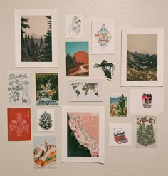 many pictures are hanging on the wall with magnets attached to it's sides