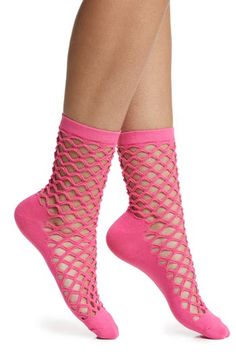 Fishnets meet crew socks in this edgy cotton-blend pair fashioned with a ribbed cuff to prevent slipping and an opaque footbed for comfort in every step. Cotton/polyester/spandex Machine wash, tumble dry Imported Trendy Stretch Hosiery For Spring, Trendy Knee-high Spring Socks, Casual Summer Stretch Hosiery, Casual Stretch Summer Hosiery, Stretch Mesh Fishnet Socks, Stretch Fishnet Socks Made Of Mesh, Stretch Fishnet Mesh Socks, Stretchable Fishnet Mesh Socks, Stretch Pink Socks For Summer