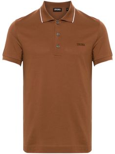 cinnamon brown cotton blend stretch-design piqué weave polo collar short sleeves contrasting trim embroidered logo at the chest straight hem short front button fastening Cinnamon Brown, Embroidered Polo Shirts, Contrasting Trim, Balenciaga Triple S, Dress Watch, Custom Watch, Summer Beach Wear, Short Suit, Polo Collar