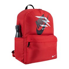 Get ready for your next adventure with the Nike 3brand by Russell Wilson daypack. It's made of durable woven fabric and features the mashup futura x 3brand logo printed on the front. The spacious main compartment houses a padded laptop sleeve, a zippered pocket on the front provides quick and easy access to smaller items, a bottle pocket on the side can hold your favorite beverage and the adjustable straps provide comfortable wear. 3% of all 3brand revenue is donated to the why not you foundatio Red Nylon Back-to-school Bags, Red Nylon Bags For Back To School, Red Sports Backpack, Red Standard Backpack For Sports, School Nylon Bag With Logo, Red Nylon Backpack For Outdoor, School Nylon Bags With Logo, Functional Red Nylon Backpack, Red Nylon Functional Backpack