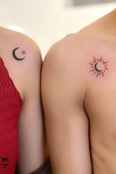 two people with sun and moon tattoos on their backs, one has a crescent tattoo