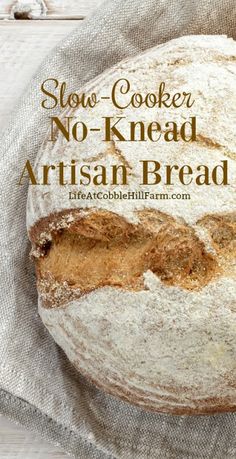 a loaf of artisan bread sitting on top of a white table cloth with the words slow cooker no - knead artisan bread