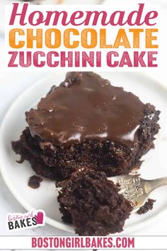 chocolate zucchini cake on a white plate with a fork