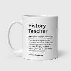 a white coffee mug with the words history teacher in black on it, sitting against a gray background