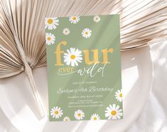 a birthday card with daisies and the words four year old on it next to a fan