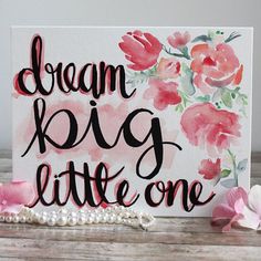 a card that says, dream big little one with pink flowers and pearls on it