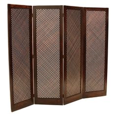 a room divider made out of wood with lattices on the top and bottom