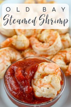 shrimp in a small glass bowl with sauce on the side