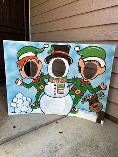 a painting of two people dressed as santa claus and a snowman on the front porch