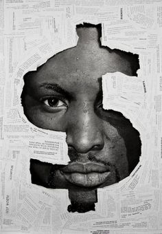 a man's face is shown through torn newspaper