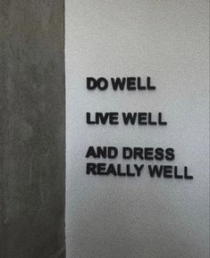 a sign that says do well live well and dress really well