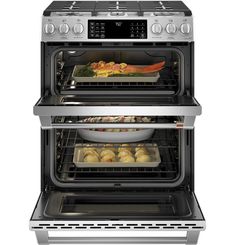 two ovens side by side with food in them