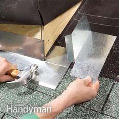 a person is working on some kind of metal object that looks like a pyramid structure