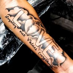 a man's arm with the word hope written on it and an arrow pointing up