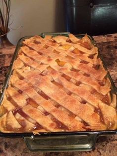 an apple pie sitting on top of a counter