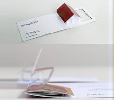 two business cards with an origami design on the front and back one is red