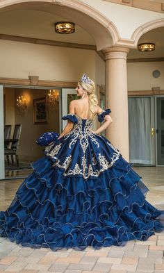 Navy blue quinceanera ball gown with strapless sweetheart neckline and ruffle layered skirt. Quinceanera Dresses Princess, Navy Blue Quinceanera, Navy Blue Quinceanera Dresses, Quinceñera Ideas, Navy Blue Ball Gown, Blue Quinceanera Dress, Blue Quinceanera Dresses