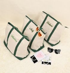 three personalized totes and sunglasses on a white furnishing with the name charlotte