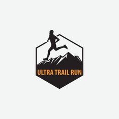 the ultra trail run logo is shown in black and orange, with an image of a person running on top of a mountain