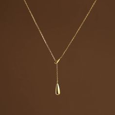 18k Gold Plated Hypoallergenic Stainless Steel Tarnish-Free Minimalist 14k Gold Drop Necklace For Formal Occasions, Luxury Teardrop Gold Chain Jewelry Gift, Elegant Everyday Drop Necklace With Clavicle Chain, Elegant Drop Necklace With Adjustable Chain For Everyday, Elegant Everyday Drop Necklace With Adjustable Chain, Modern Yellow Gold Drop Jewelry, Gold Plated Teardrop Drop Necklace, Gold Plated Teardrop Necklace, Gold Drop Necklace With Clavicle Chain And Teardrop Pendant