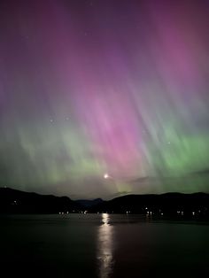 an image of the aurora over water at night