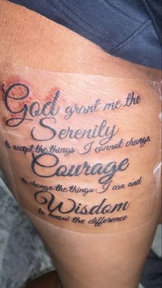 a woman's thigh with the words god grant me the serenity and change