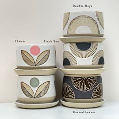 Julems Ceramics Planters for 4-4.5 plants in flower design, black sun, sun rays and carved leaf patterns. Mitchell Grafton, Ceramics Planter, Olive Palette, Sgraffito Ideas, Terracotta Paint, Retro Pottery, Geometric Planter, Scandinavian Aesthetic, Pottery Painting Designs