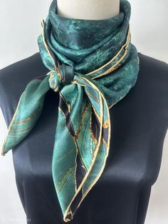 Vibrant turquoise green natural mulberry silk square scarf with size of 88 cm x 88 cm/ 35 in x 35 in. Hand-rolled golden edges with hand stitching finishing. Gorgeous, velvety turquoise print, embellished with dreamy golden-copper streaks. Soft and lustrous silk charmeuse, light weight, semi translucent, breathable and skin-friendly fabric feels very comfortable to wear. Can style in different ways: wear this scarf as a neck scarf, as a hair wrap scarf, as a head scarf, as a small shawl...Suitab Formal Green Silk Scarves, Formal Green Silk Scarf, Green Silk Scarves For Formal Occasions, Green Silk Scarf For Formal Occasions, Elegant Green Scarf For Formal Occasions, Green Silk Shawl Scarf, Elegant Green Silk Shawl, Elegant Green Silk Shawl Scarf, Bohemian Green Silk Scarves